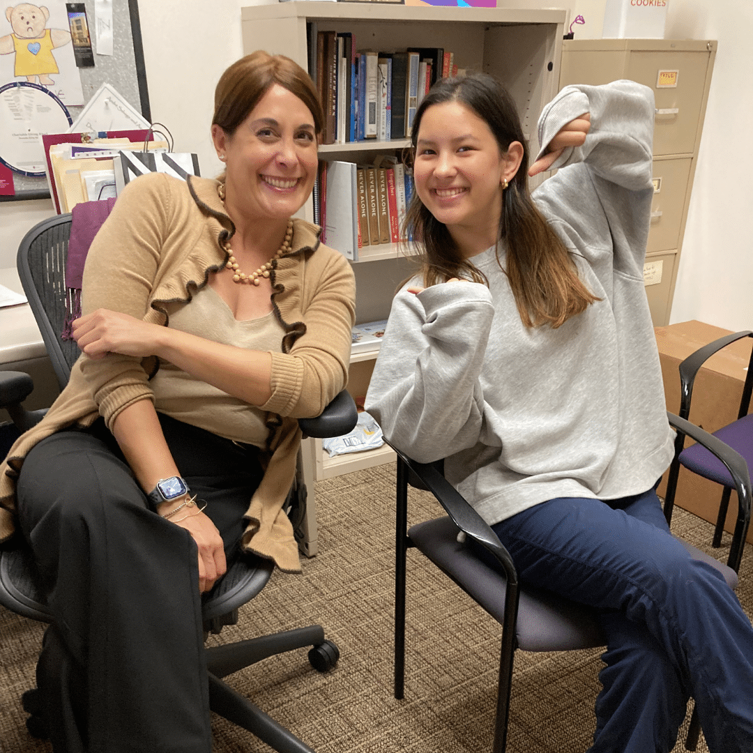 JFCS Intern Poses Playfully with her Supervisor